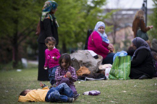  Évacuation dans le calme du plus grand campement de migrants de Paris